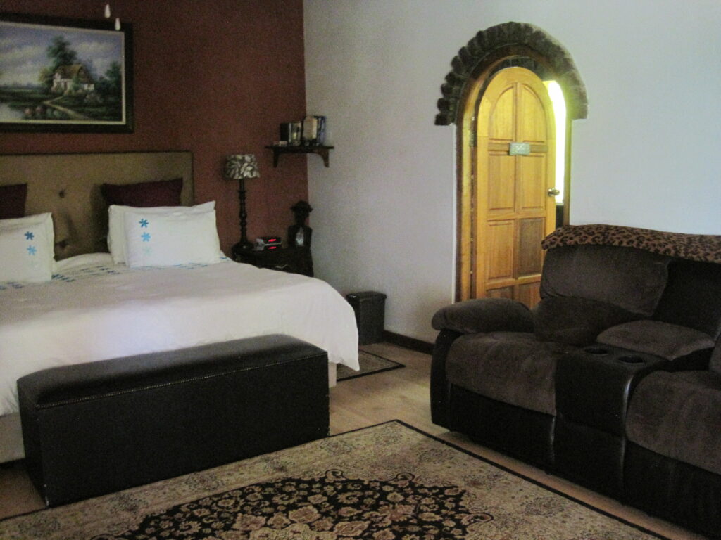 Honeymoon Suite bed and lazyboy couch
