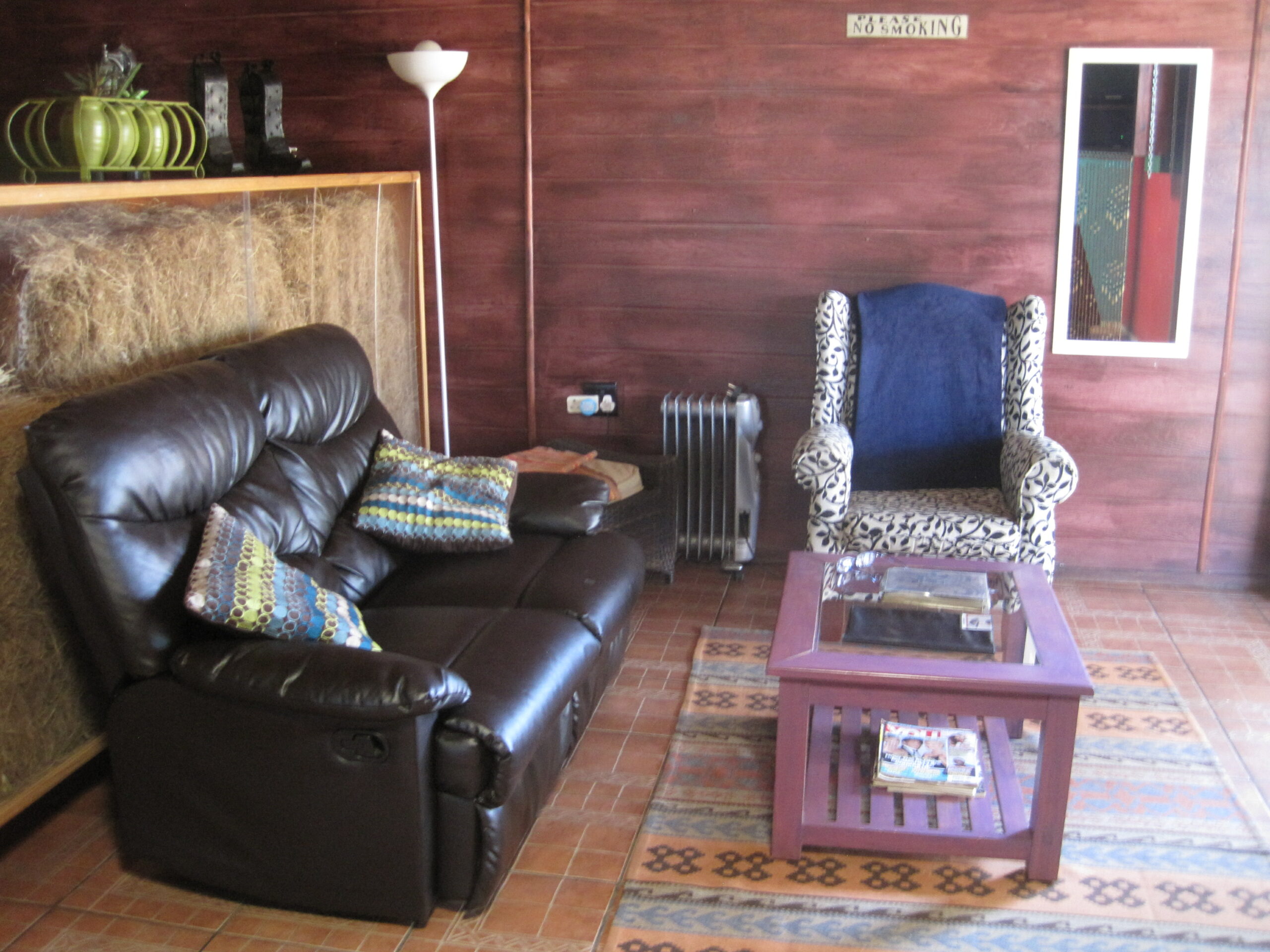 The Mexican lounge with a log fireplace